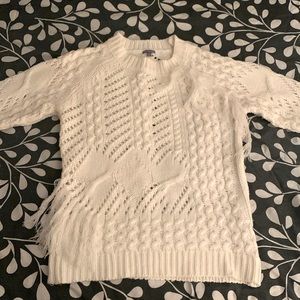 White sweater with ruffle detailing